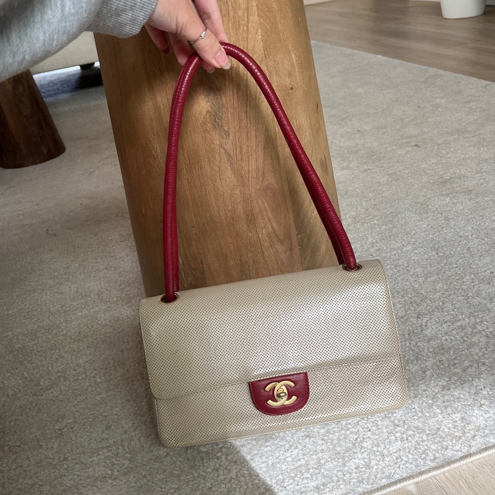 Vintage Chanel medium flap bag perforated leather beige red